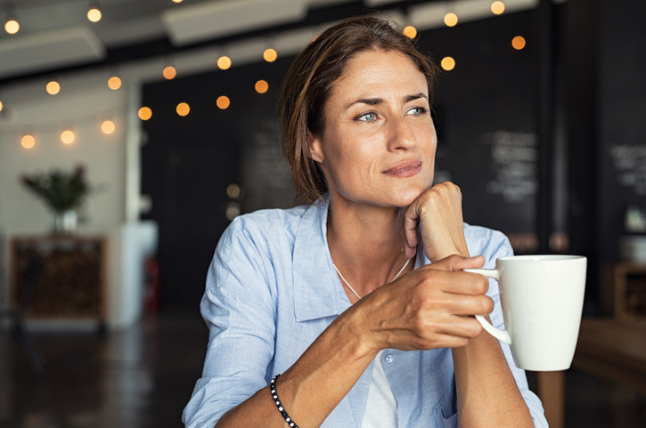 Woman drinking coffee Nowzaree Law family law attorneys